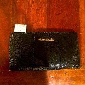 Michael Kors black genuine leather clutch